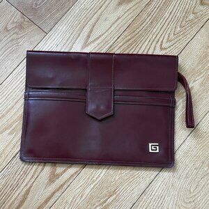 2.	Chestnut/deep burgundy color, real leather envelope-style clutch purse